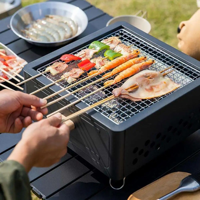 شواية فحم محمولة للتخييم مع در - مراجعة Camping With Cooking وسعره